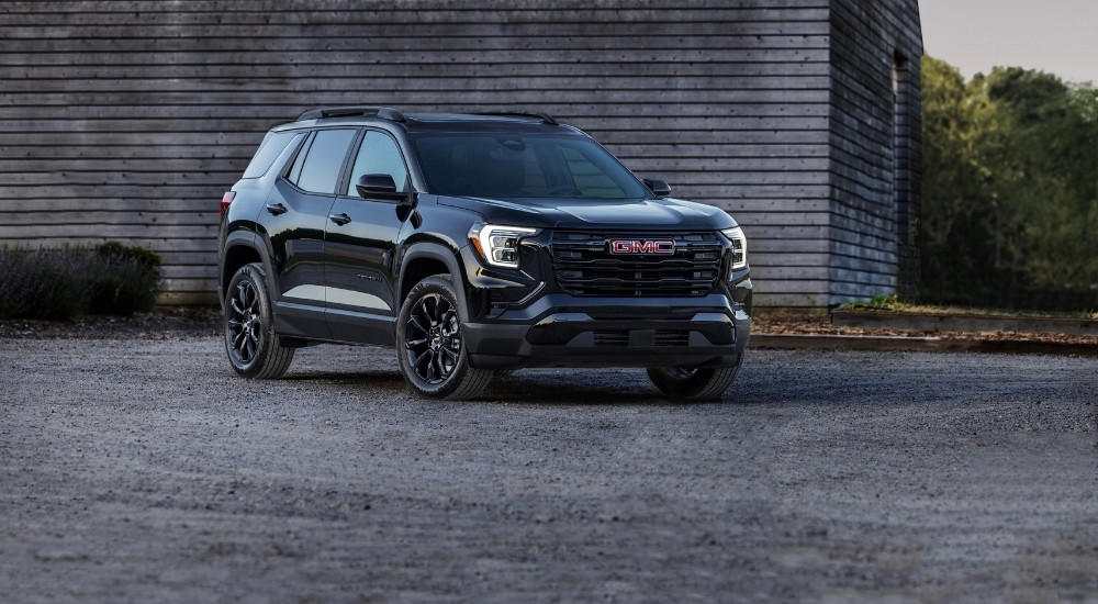 A black 2025 GMC Terrain from the front.