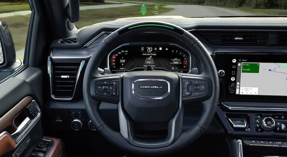 Close-up of the steering wheel in a 2022 GMC Sierra 1500 Denali.