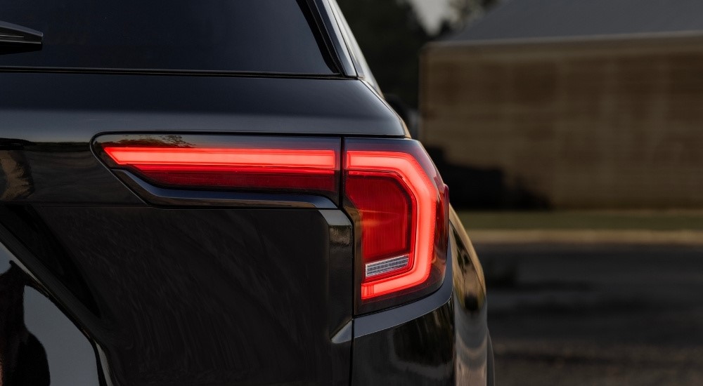 A black 2025 GMC Terrain from the rear.
