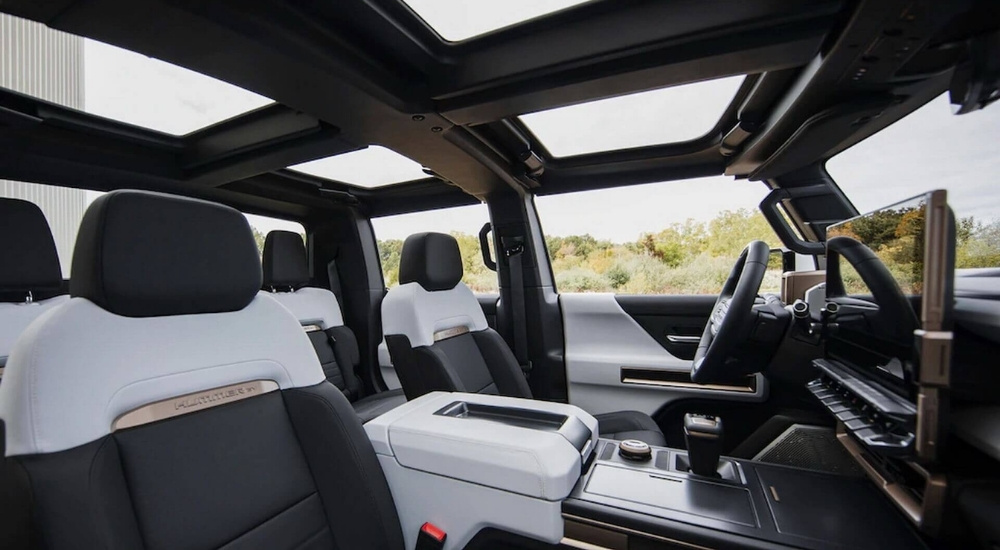 The black and white interior of a 2022 Hummer
