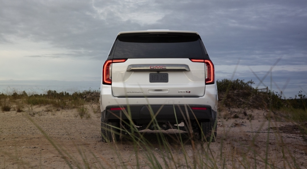 White 2022 GMC Yukon AT4 parked off-road