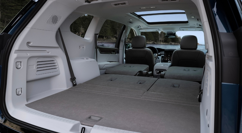 Trunk and rear folded seats in a 2025 GMC Acadia Denali 