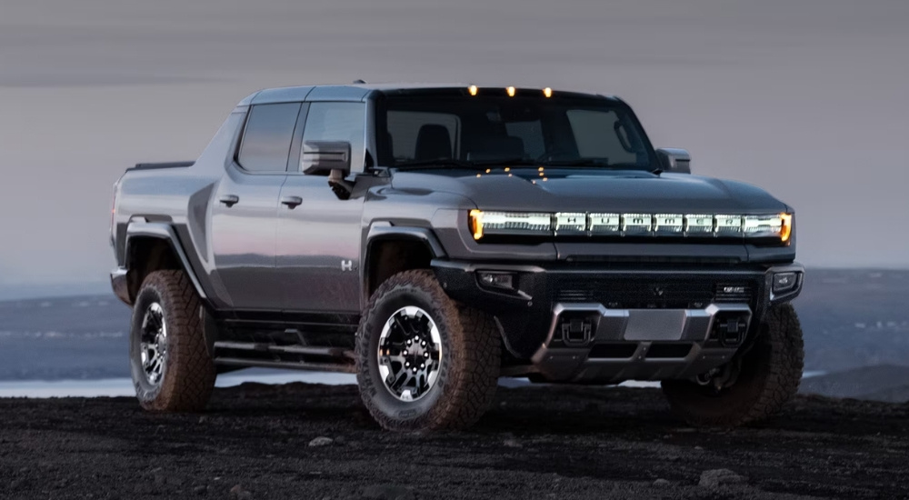 Grey 2025 GMC Hummer EV parked off-road