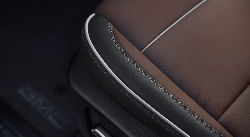 Brown leather seat in a 2025 GMC Sierra 1500 Denali Ultimate.