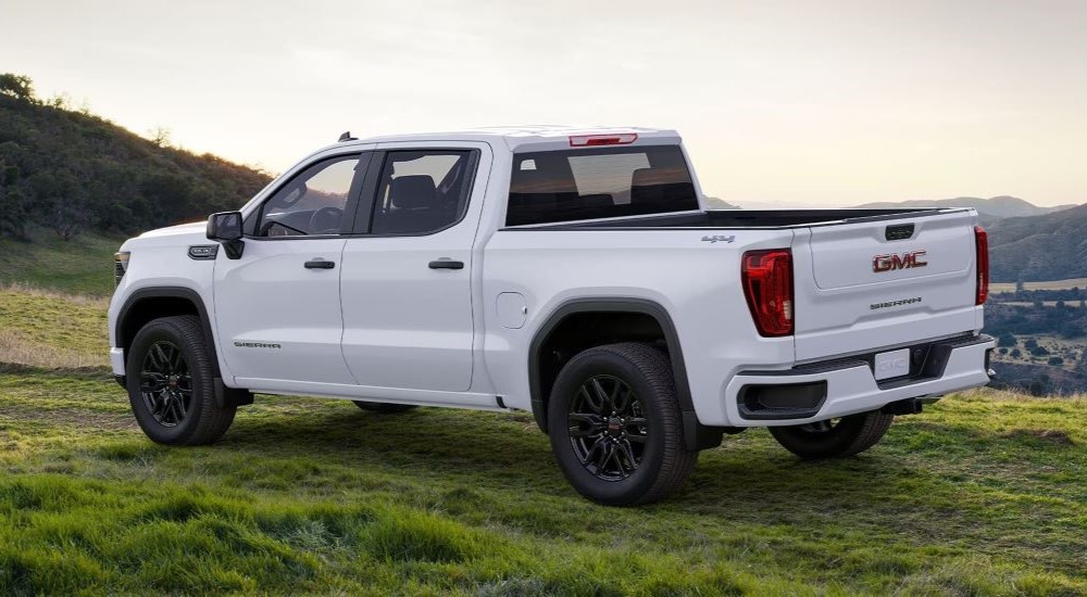 White 2025 GMC Sierra 1500 Pro Graphite Edition parked off-road