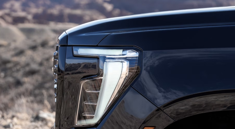 Headlight on a black 2025 GMC Yukon Denali