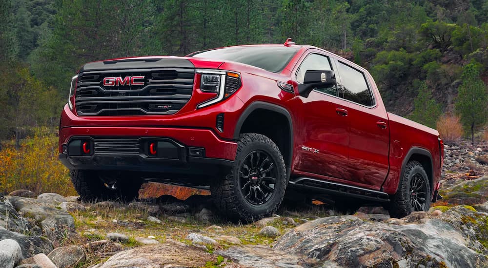 Red 2025 GMC Sierra 1500 AT4X off-roading