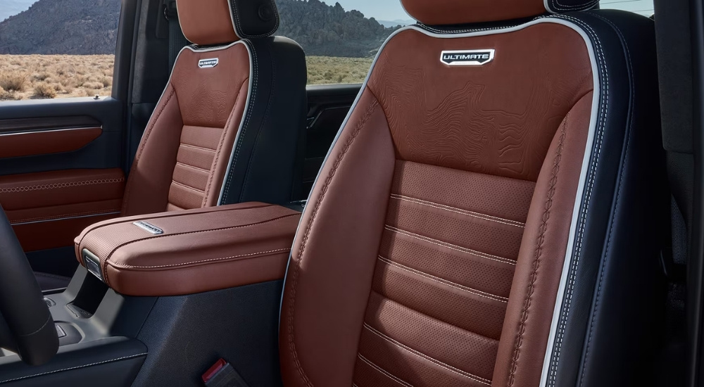 Black and brown seating in a 2026 GMC Sierra 2500 HD Denali Ultimate