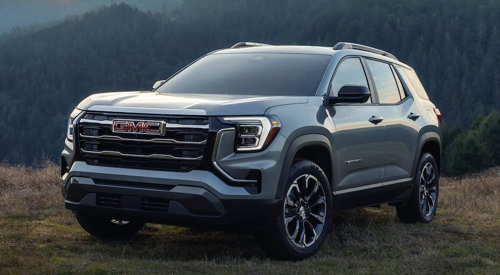 Grey 2026 GMC Terrain parked overlooking a mountain view