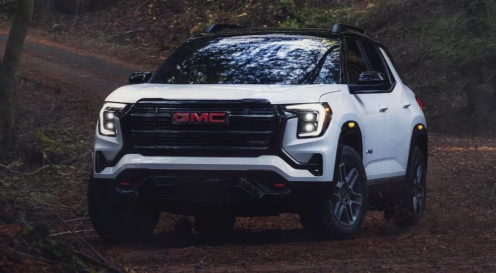 A white 2026 GMC Terrain parked off-road.