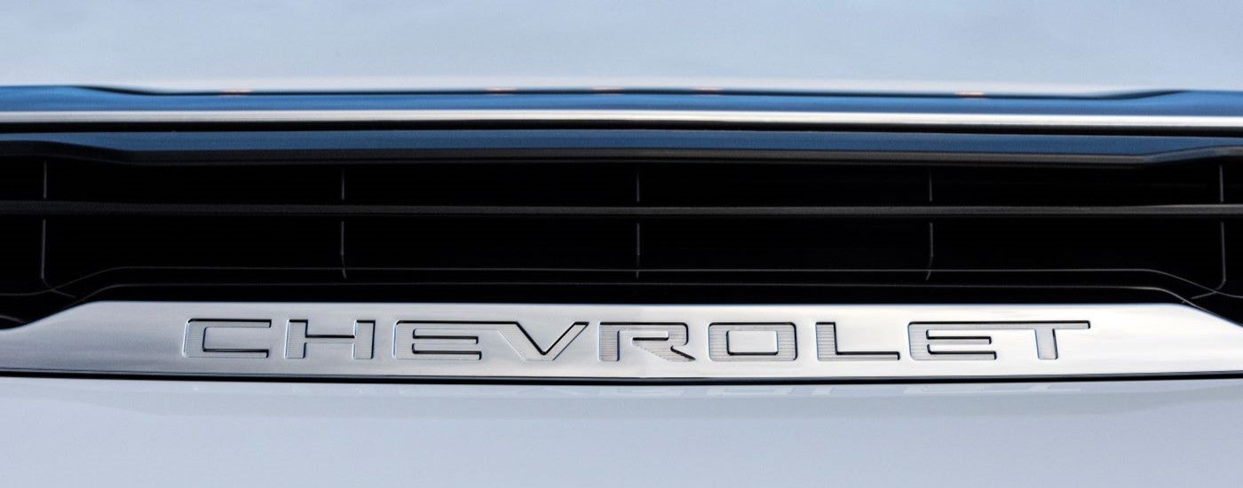 A close up shows a black vent on a white 2024 Chevy Silverado for sale near Selmer.