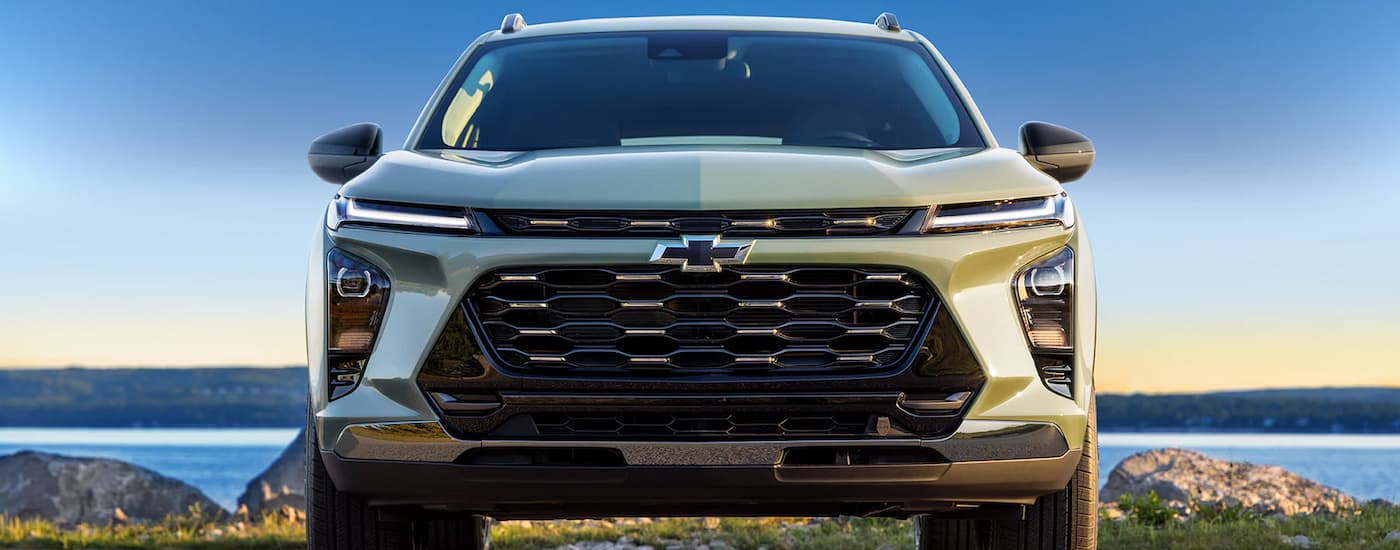 A green 2024 Chevy Trax is shown from the front after leaving a Ripley Chevy dealer.