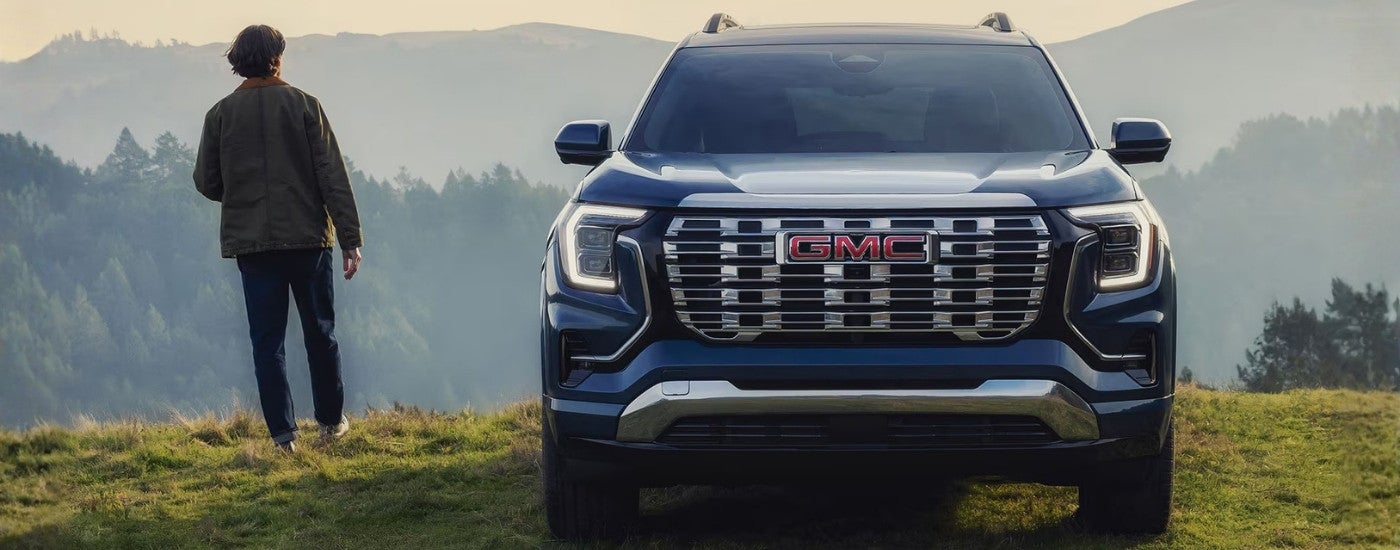 Blue 2026 GMC Terrain parked at an overlook