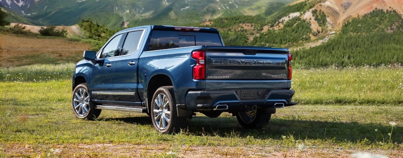 A blue 2022 Chevy Silverado for sale is shown from the rear.