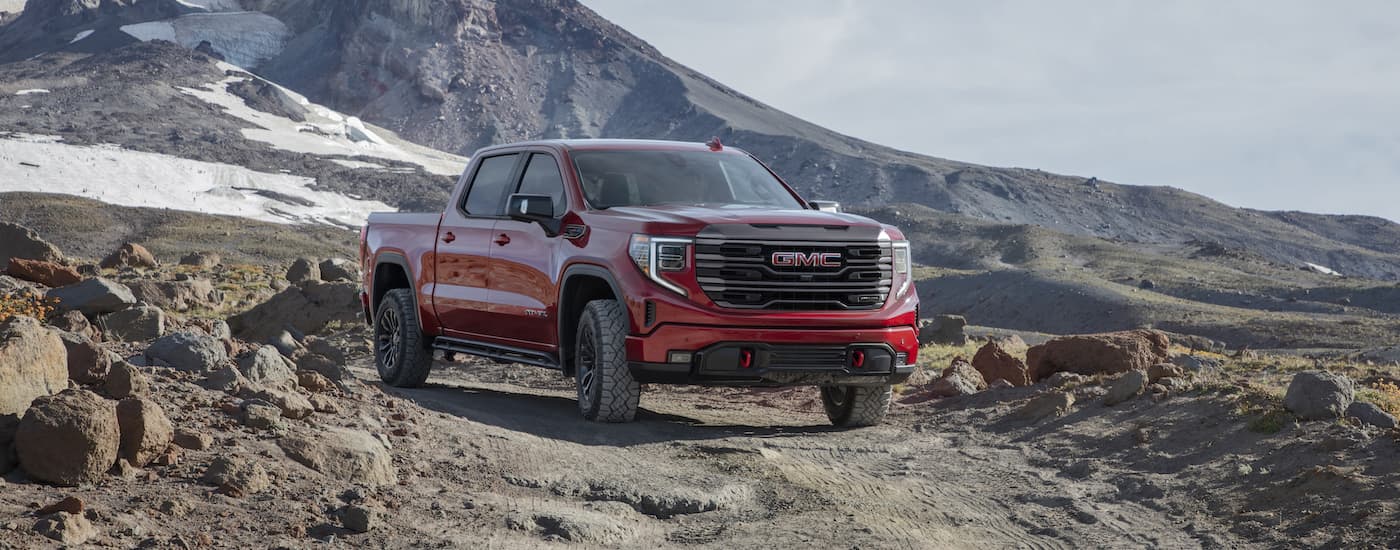 Red 2022 GMC Sierra 1500 AT4x is shown from the front at an angle