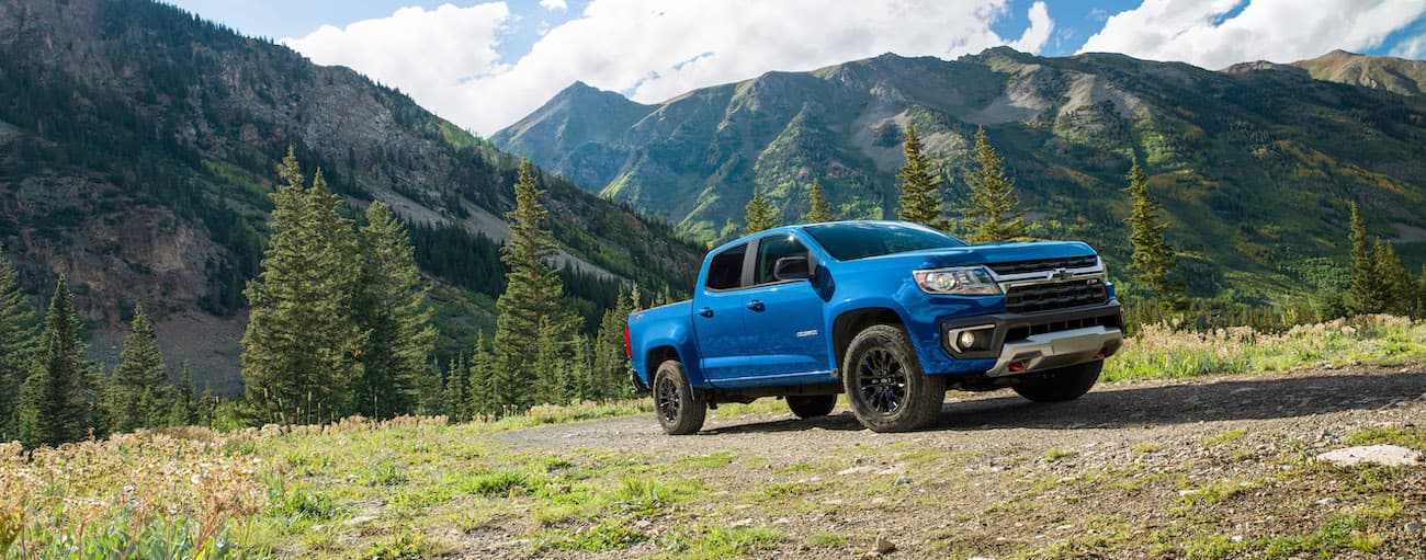 A blue 2022 Chevy Colorado Z71 is shown from the front at an angle.